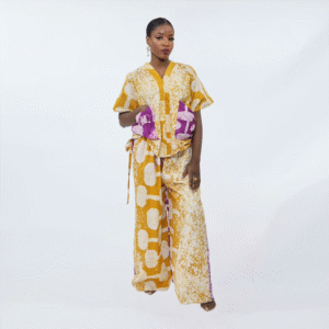 Two-piece adire set with a cropped top and flowy floor-length pants.